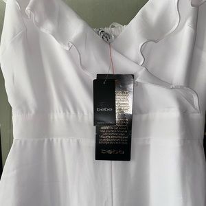 BEBE all white jumpsuit.